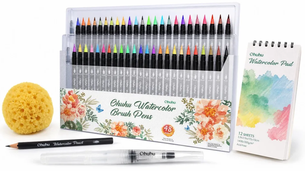 The Ohuhu 48-color palette surrounded by its included sponge, pencil, water brush pen, and small watercolor pad.