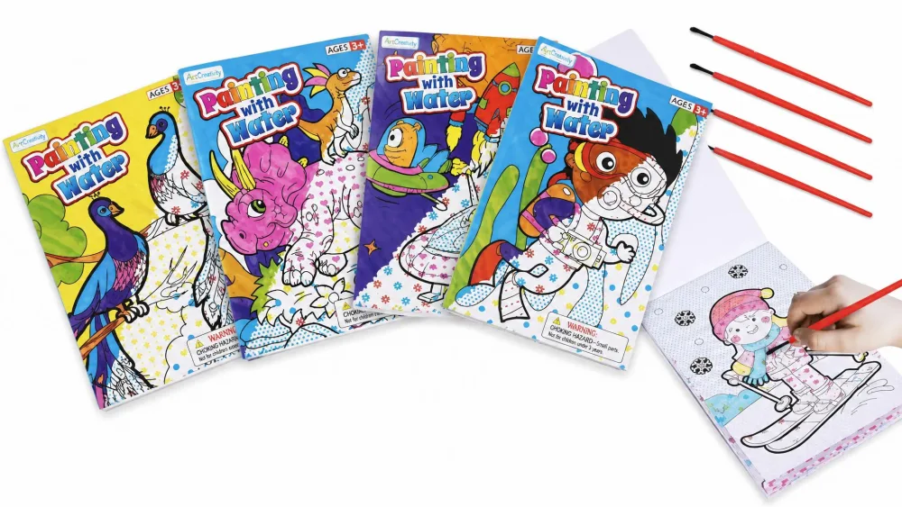 The four themed ArtCreativity mini watercolor books fanned out next to their included paintbrushes