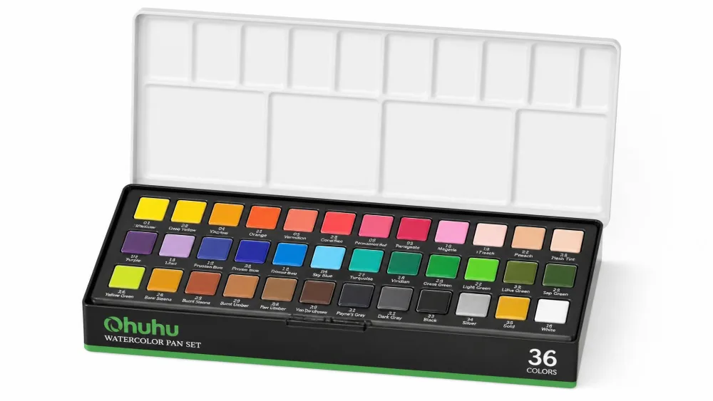 The Ohuhu 36-color watercolor pan set open with its lid flipped up as a mixing tray.