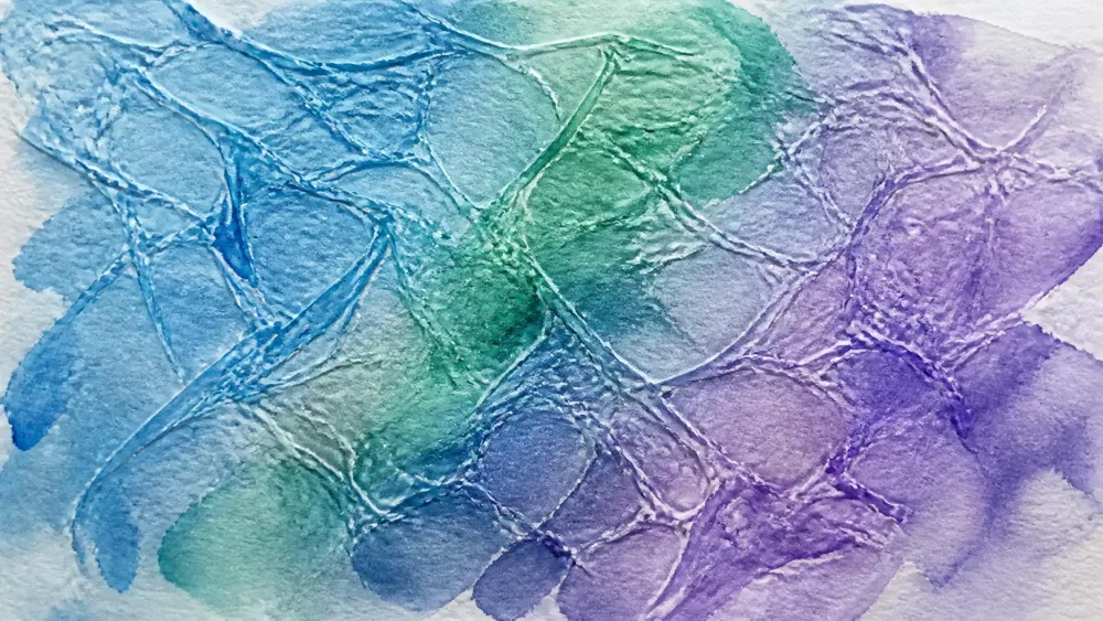 Crumpled plastic wrap pressed into a wet watercolor wash.
