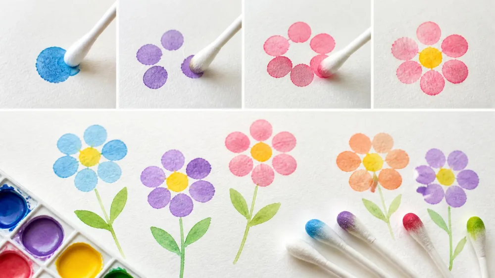 Cotton swabs dabbing watercolor dots into simple flowers.