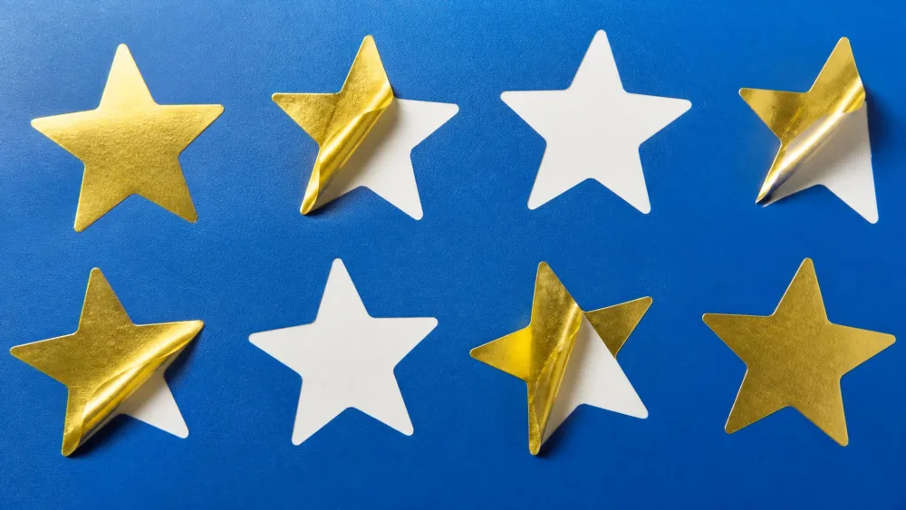 Star stickers peeled to reveal clean white shapes.