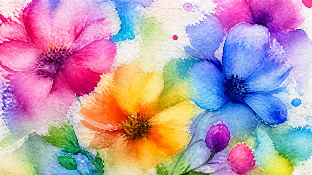 Bright watercolor colors blooming across damp paper.