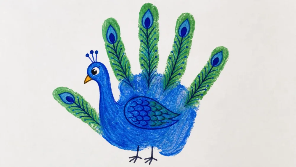 A blue and green handprint turned into a peacock with marker details.