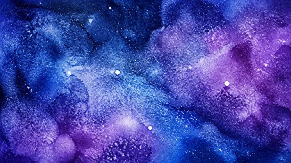 Blue and purple watercolor galaxy, salt-textured with white flecks.